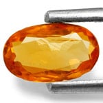 0.47-Carat Orange Oval Cut Clinohumite from Mahenge, Tanzania