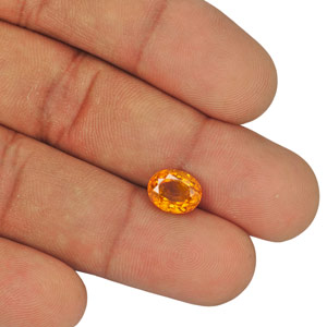 3.05-Carat Vivid Yellowish Orange Eye-Clean Tajik Clinohumite - Click Image to Close