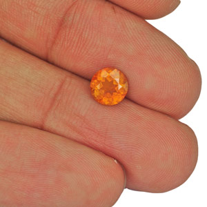 1.19-Carat 7mm Round Eye-Clean Yellowish Orange Clinohumite - Click Image to Close