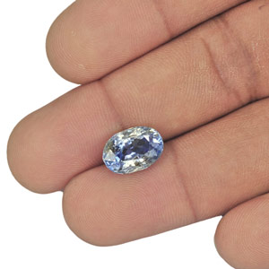 6.83-Carat Unheated Oval-Cut Bi-Color Sapphire from Sri Lanka - Click Image to Close
