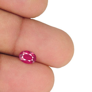 0.69-Carat Rare VVS-Clarity Unheated Pinkish Red Mozambique Ruby - Click Image to Close