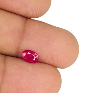 0.66-Carat Eye-Clean Deep Pinkish Red Oval-Cut Ruby (IGI) - Click Image to Close