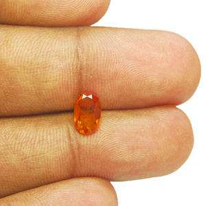 0.77-Carat Scintillating Deep Orange Tanzanian Clinohumite - Click Image to Close