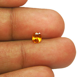 0.45-Carat High-Clarity Fiery Orange Tanzanian Clinohumite - Click Image to Close