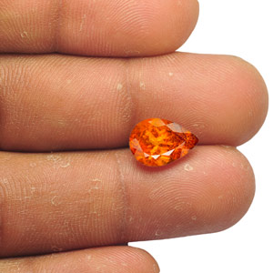 2.87-Carat Bright Neon Orange Clinohumite from Tanzania - Click Image to Close