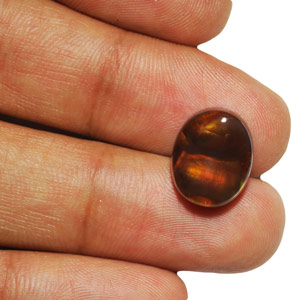 7.98-Carat Oval Fire Agate with Greenish Orange Flashes - Click Image to Close