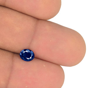 0.90-Carat Eye-Clean Royal Blue Sapphire from Madagascar (IGI) - Click Image to Close