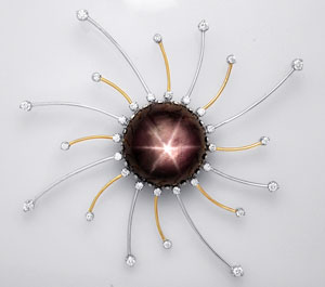 14K Gold Pendant mounted with a 35.44-Carat Black Star Sapphire & Diamonds